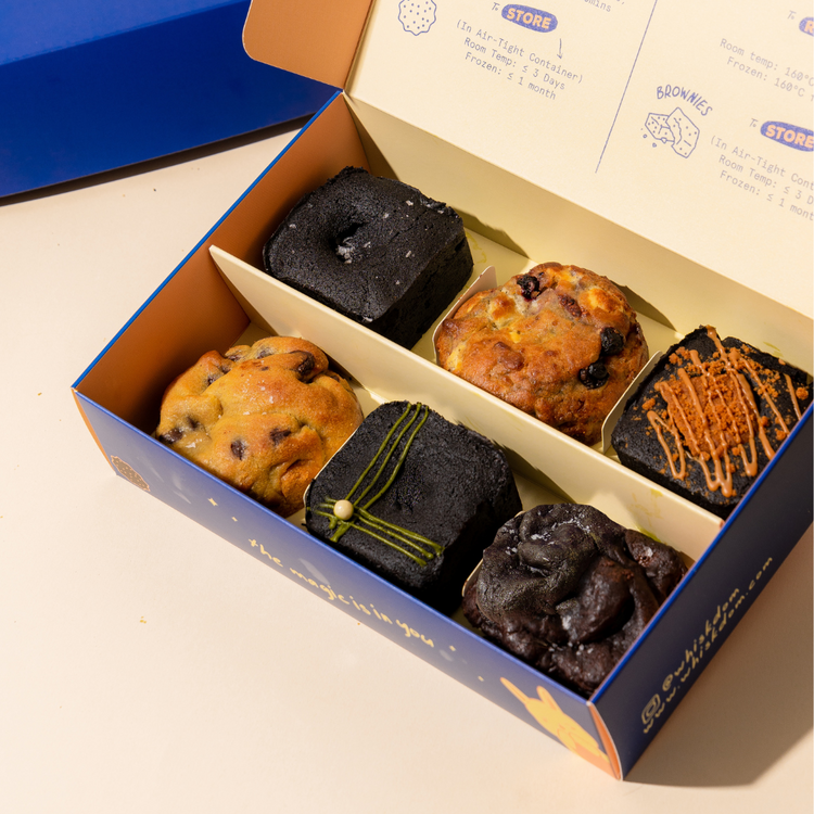 Assorted six classic box with six cookies and brownies on white background