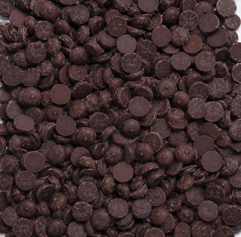 Close-up of dark chocolate chips on a white background